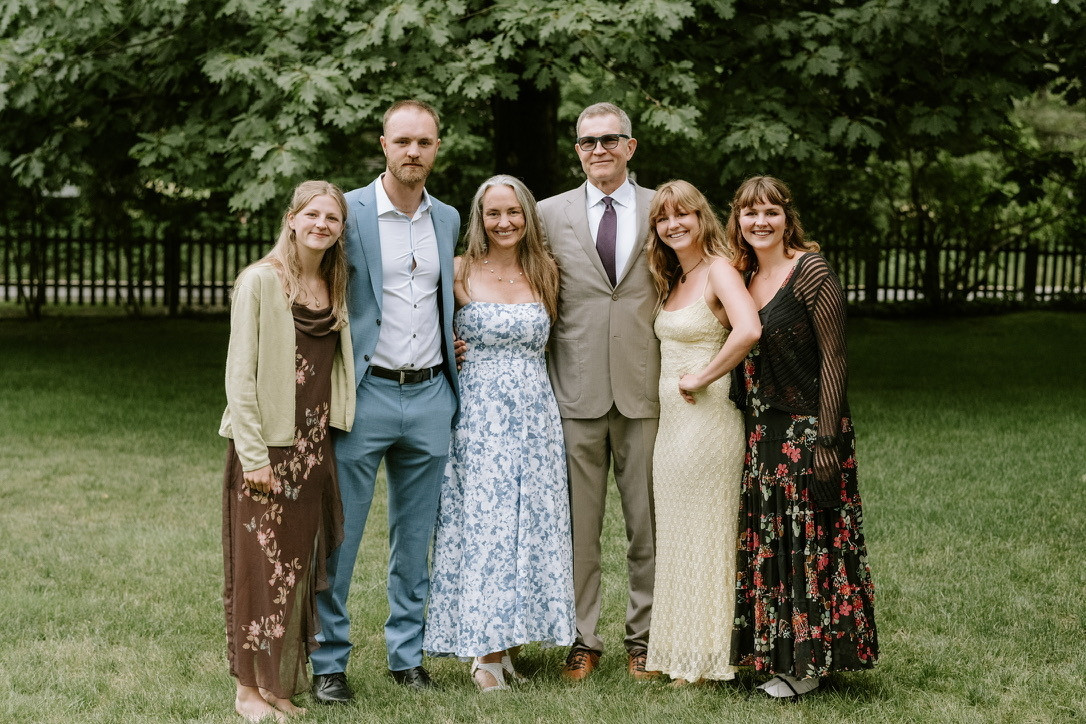 Group photo of the Baszucki family, standing together outdoors and smiling—representing their commitment to advancing metabolic psychiatry and mental health